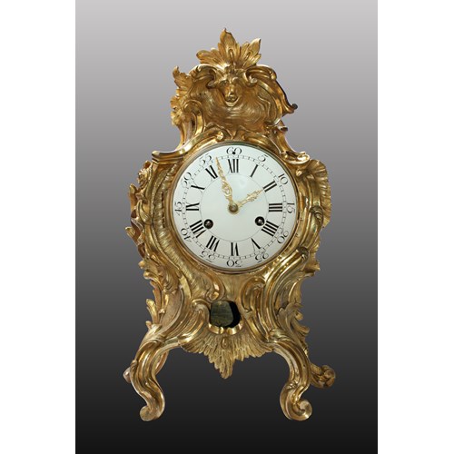 A large Louis XV ormolu-clock by Jean-Baptiste Baillon  

